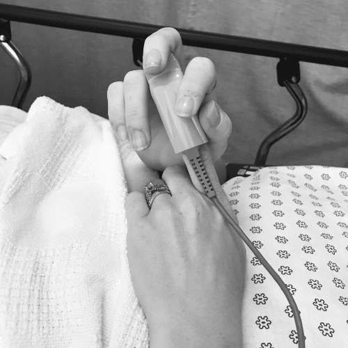 Woman in hospital bed